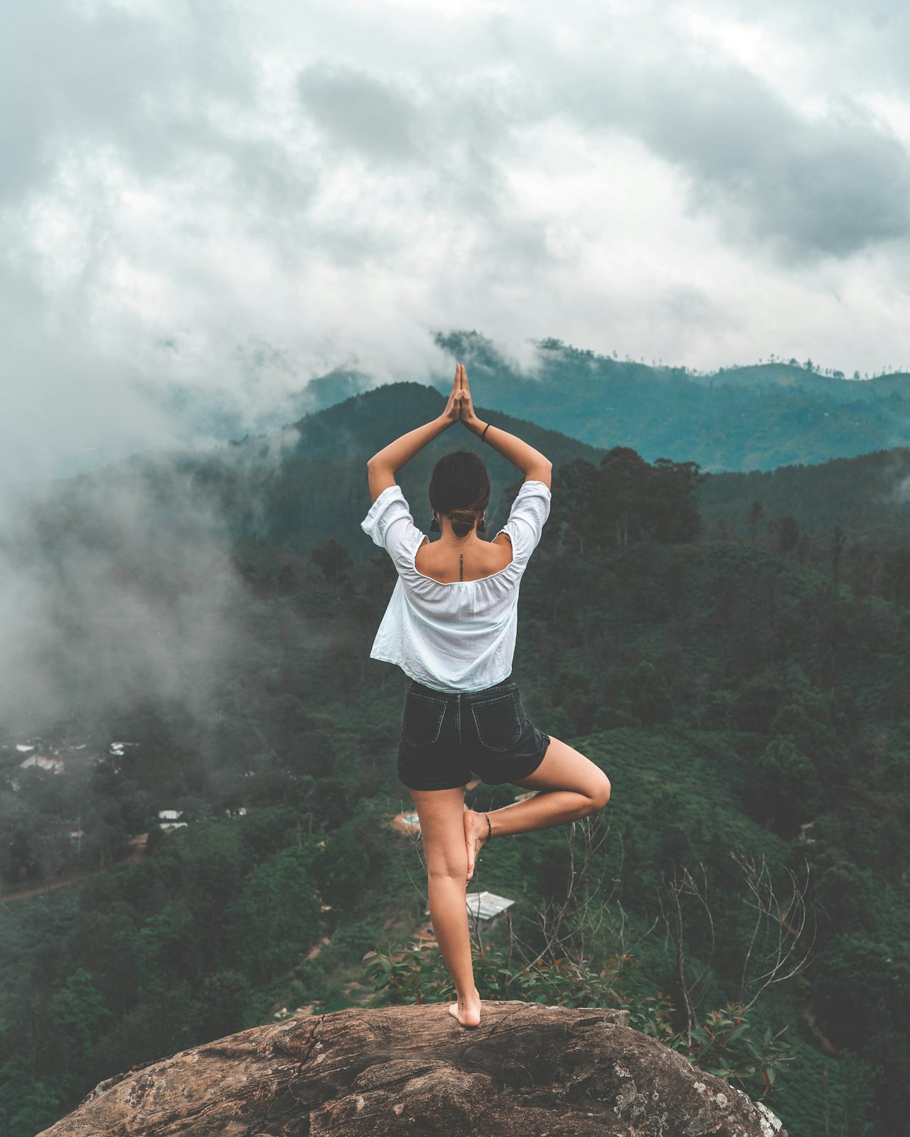 Midlife woman meditating — CBT and mindfulness for menopausal mood
