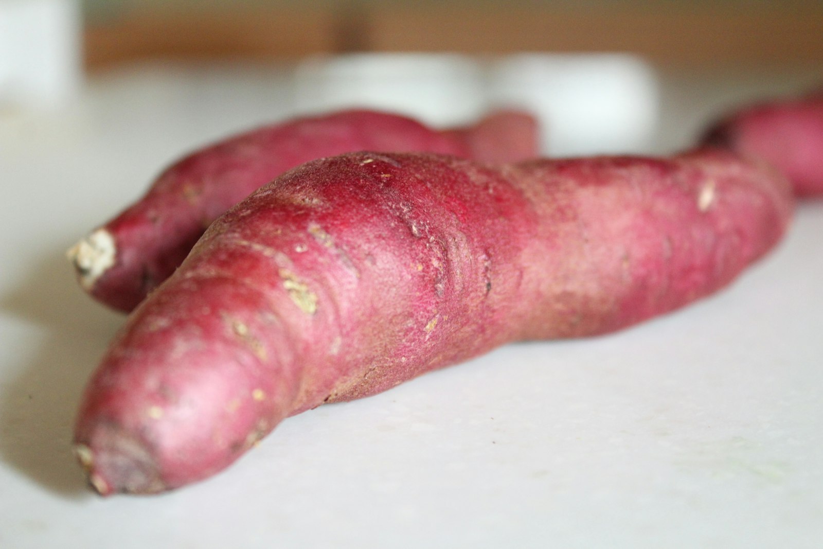 Purple Korean sweet potato sliced showing anthocyanin pigment
