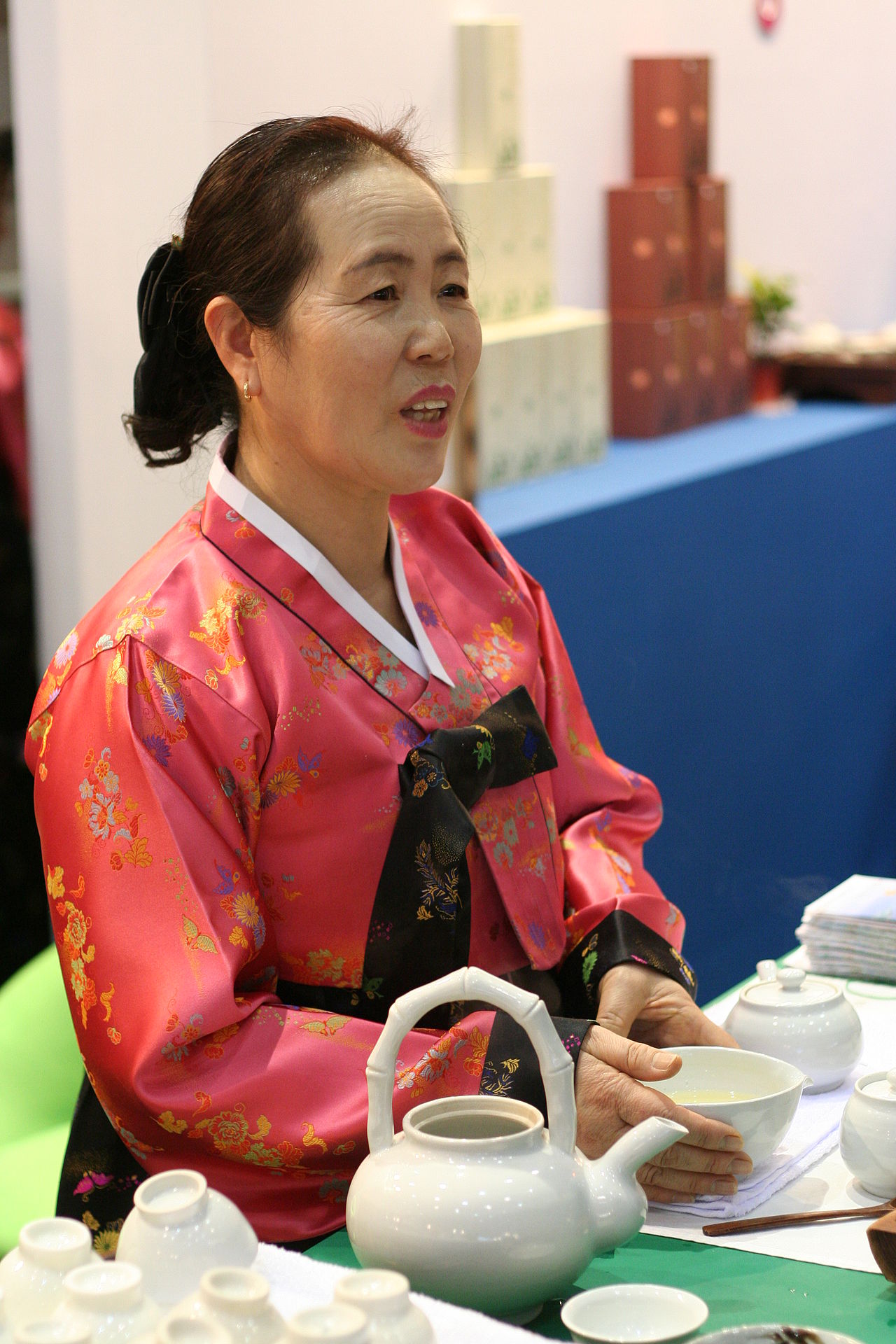 Korean darye tea ceremony with hands pouring green tea